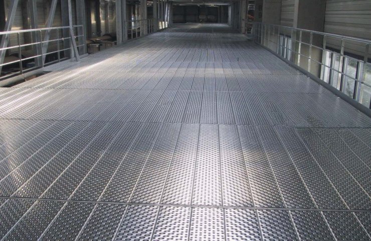 Pressed stainless steel flooring
