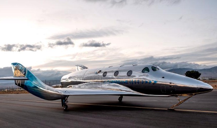 Virgin Galactic unveils polished stainless steel spaceplane