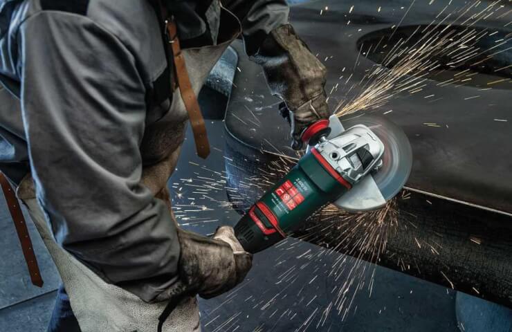 What materials does an angle grinder work with?