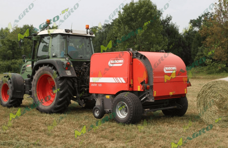 What is a round baler and how does it work?